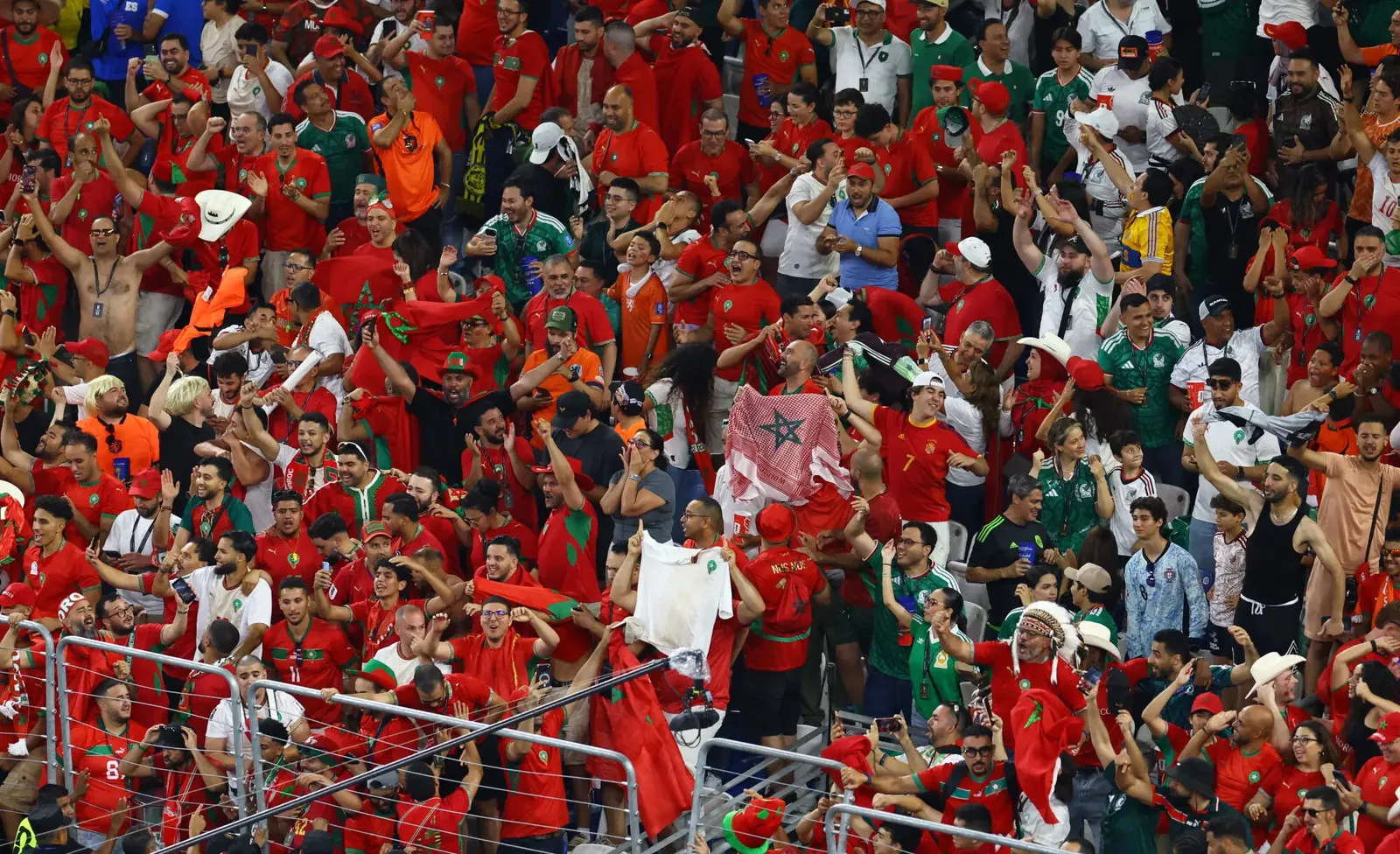 Morocco fans celebrate after Issa Diop scores their first goal against the Netherlands in Estadio Monterrey, Monterrey, Mexico on June 29.
