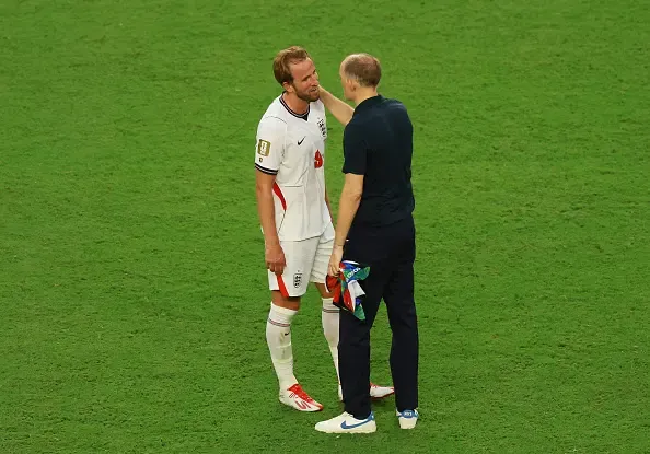 Thomas Tuchel, Manager of England, celebrates with Harry Kane
