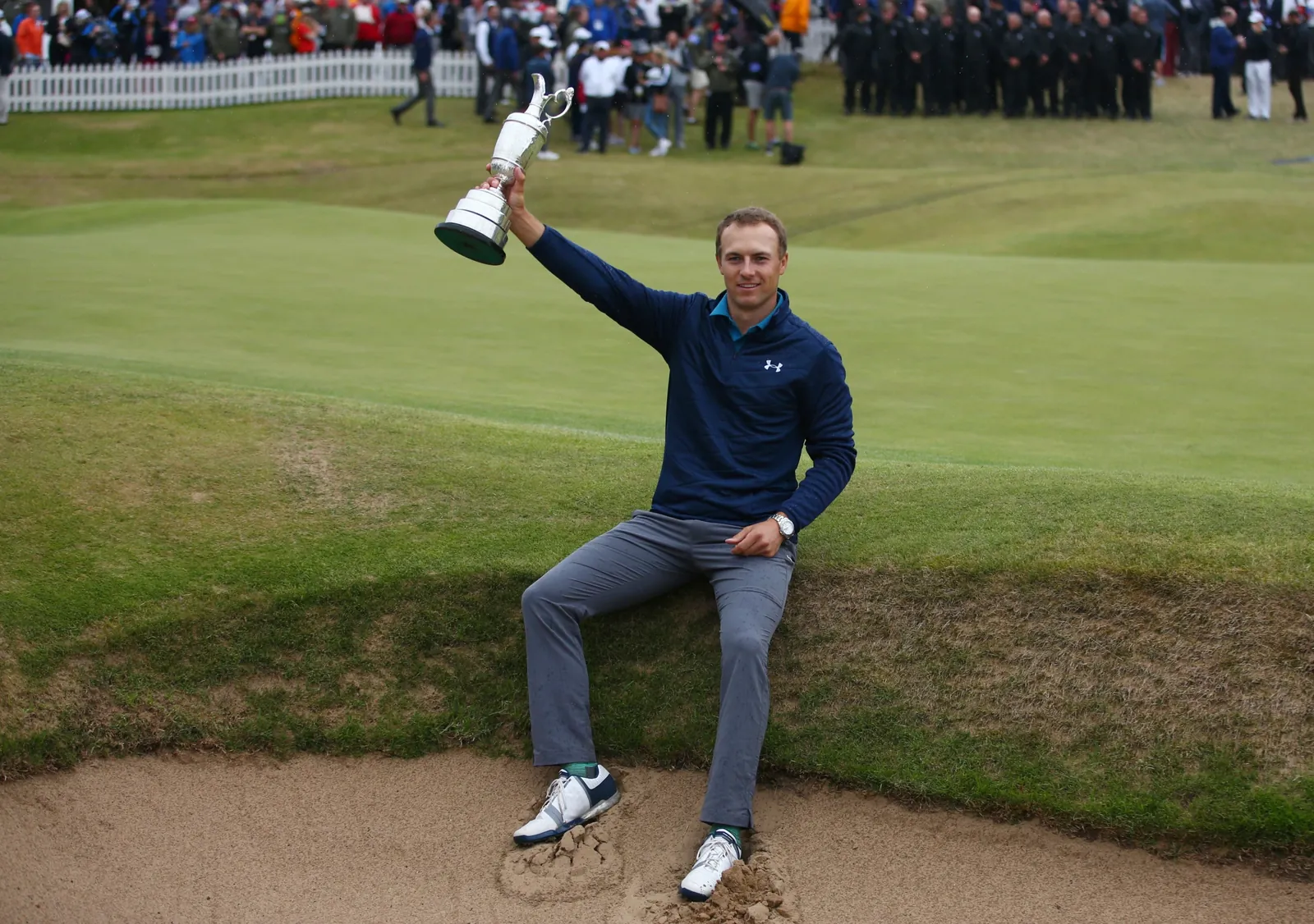 Jordan Spieth of the United States holds the trophy after winning the British Open Golf Championships at Royal Birkdale, Southport, England, July 23, 2017. (AP Photo/Dave Thompson, File)