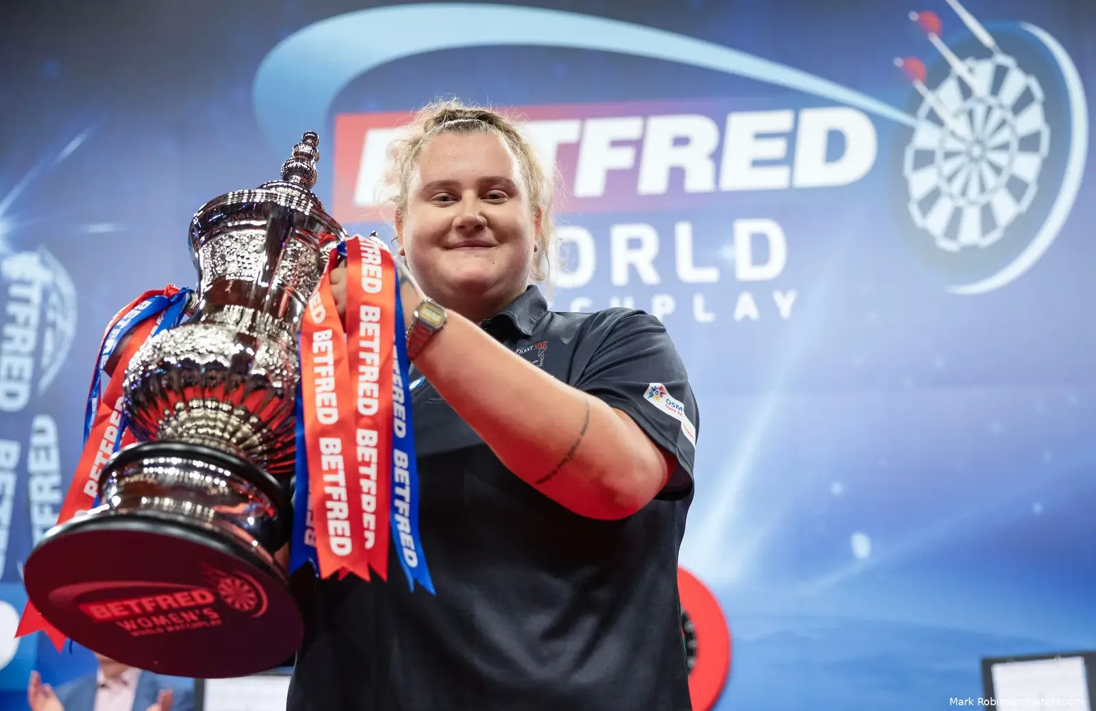 Beau Greaves lifting the Women's World Matchplay title